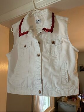 White Sleeveless Denim Vest with Red Sequin Collar.
